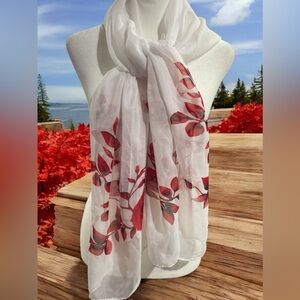 Women’s scarf. Light and easy care. White with red floral design. Pre-loved

A11